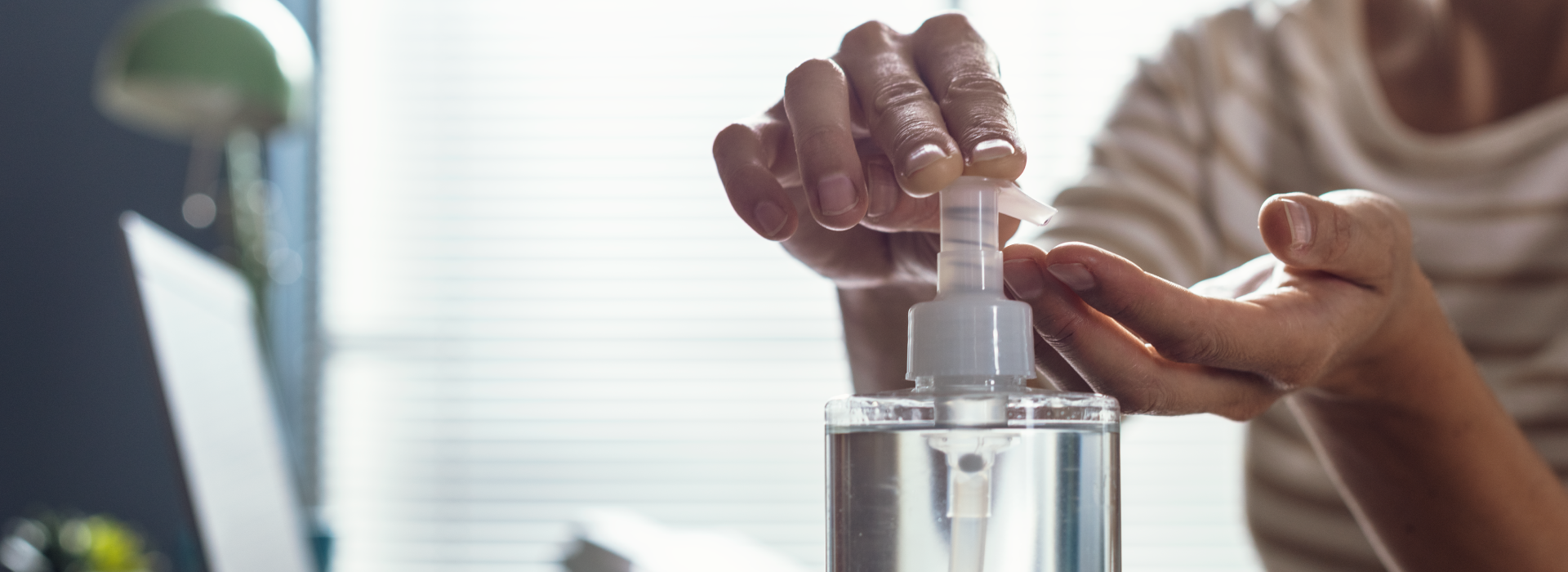 Using hand sanitiser pump