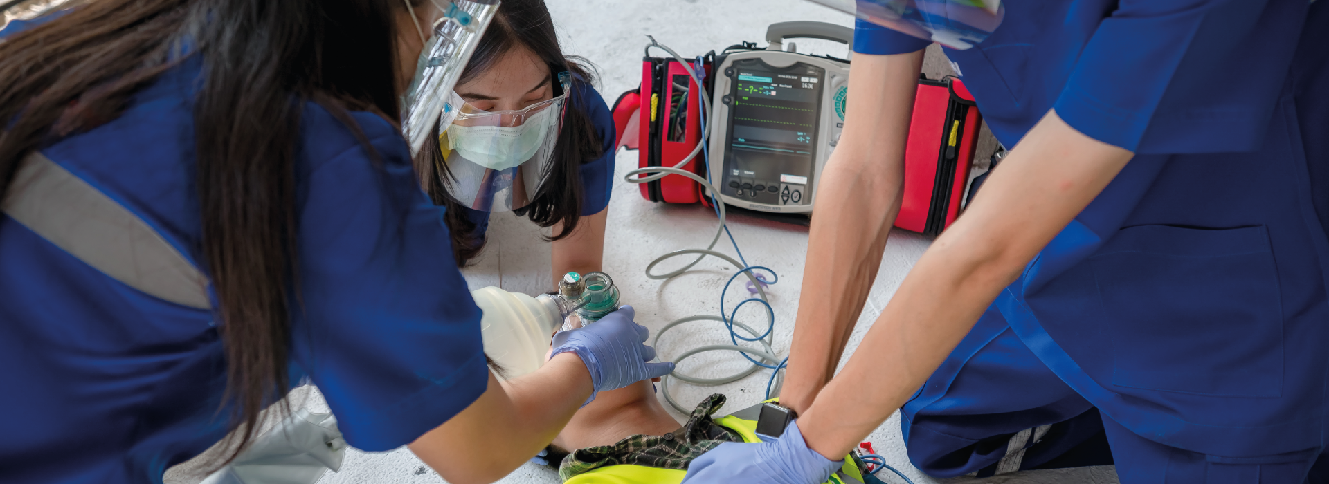Medical professionals using AED