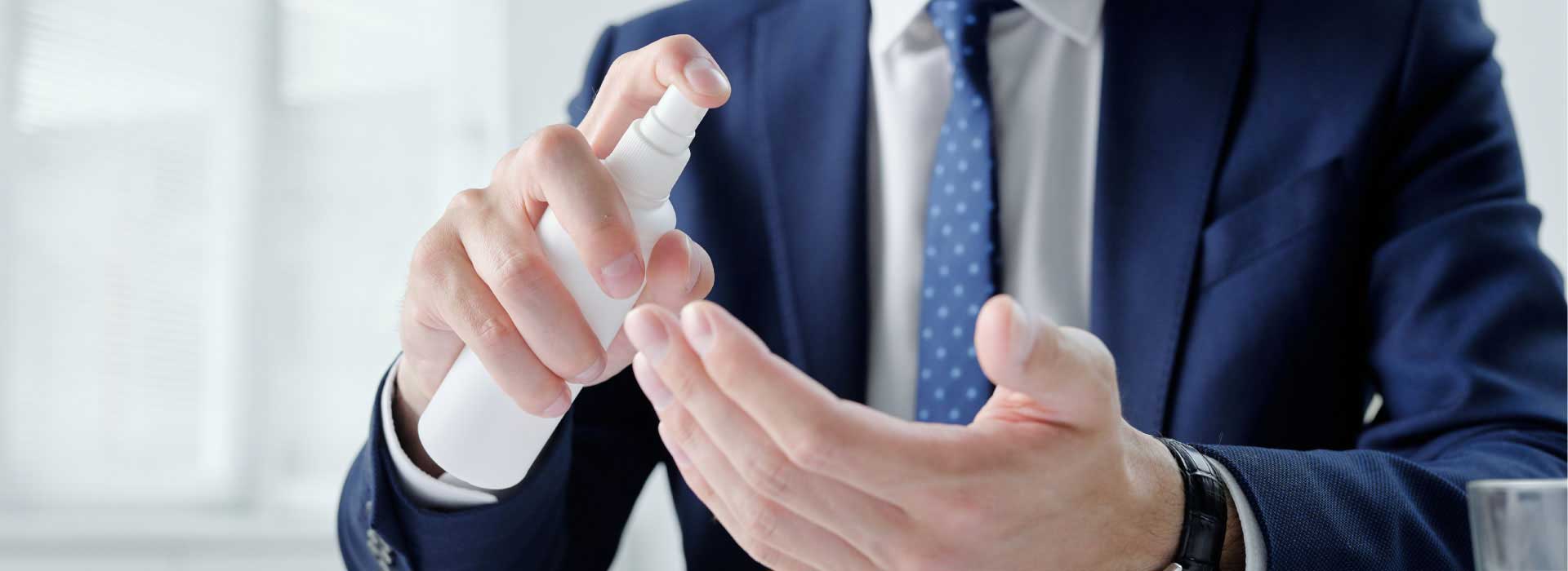Sanitising hands in office