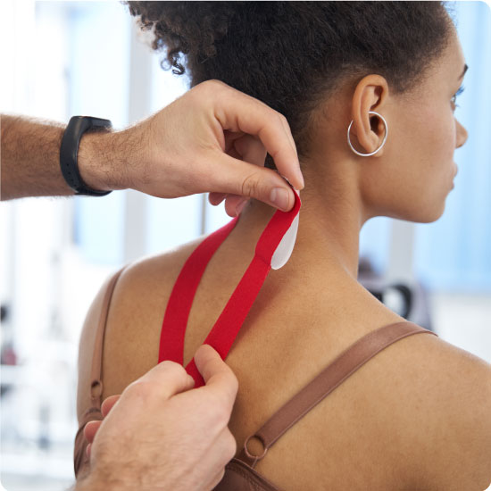 Tape on womans back