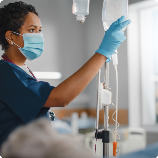 Doctor using an IV drip