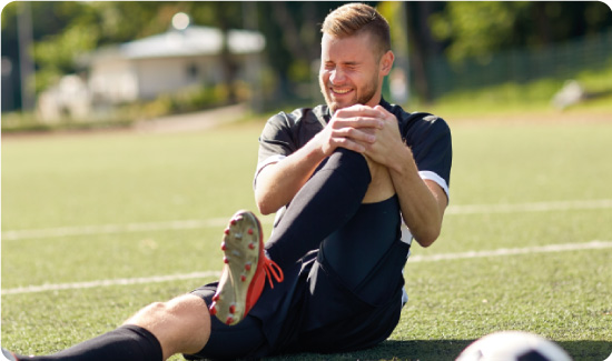 Footballer with Knee Injury