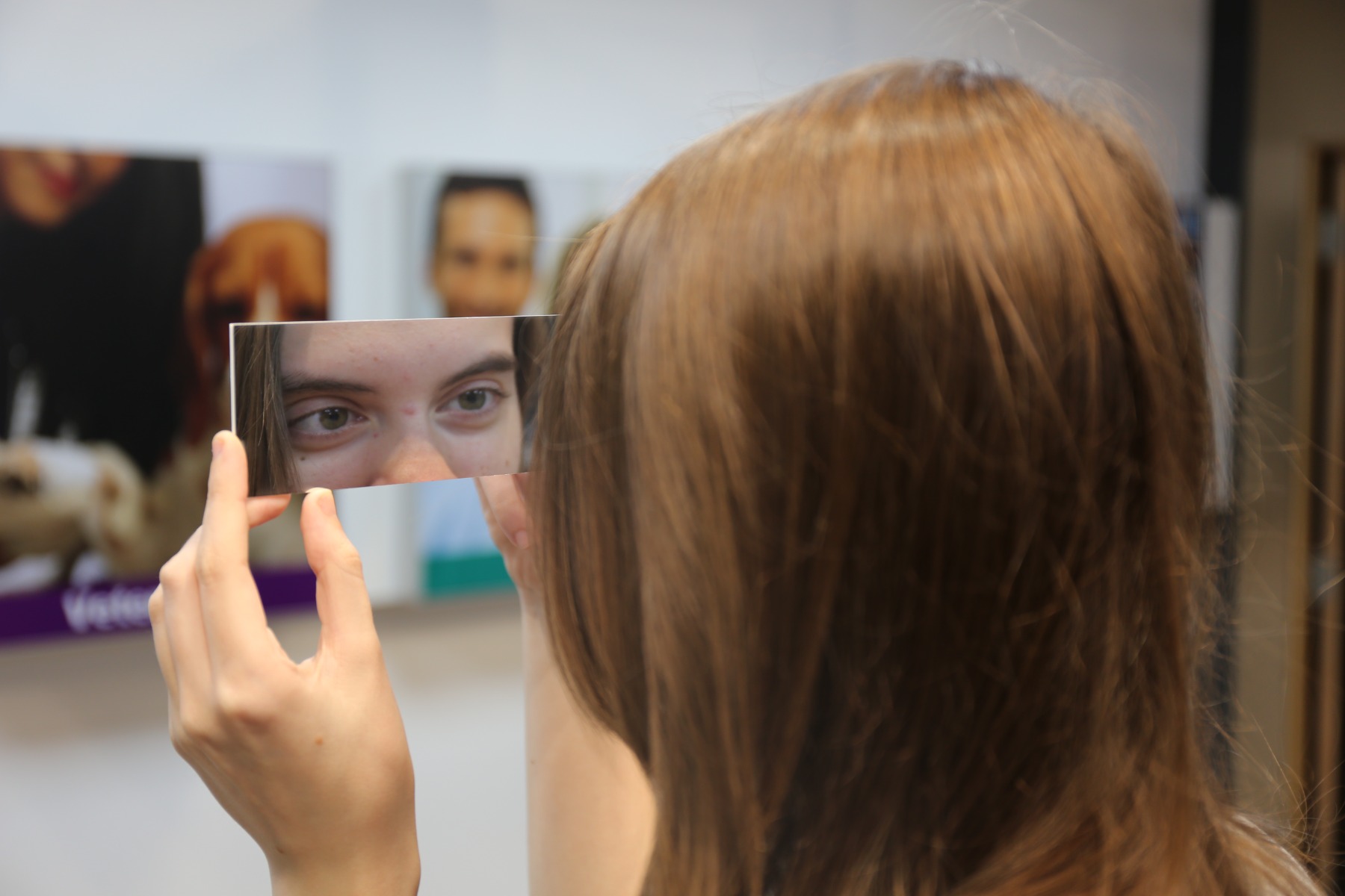 Looking in mirror at eye injury