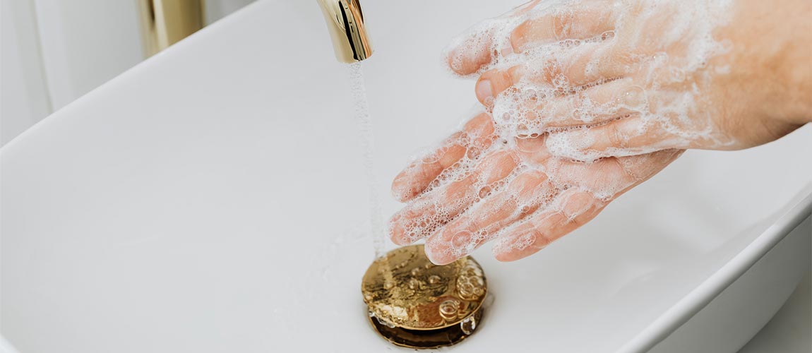 Man washing hands with soap