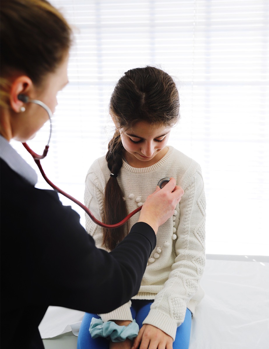Medical worker holding stethoscope