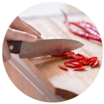 Person Cutting Chillies