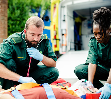 Paramedic team rescuing a critical patient