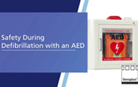 Steroplast article cover titled 'Safety During Defibrillation with an AED' showing a wall-mounted AED defibrillator in a protective case.