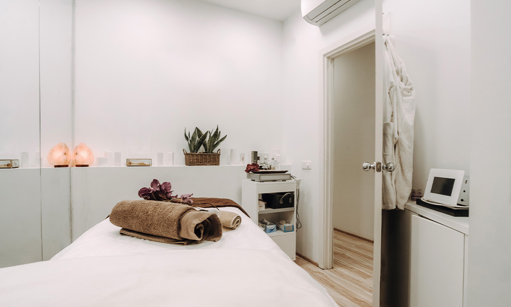 Stylish Spa room interior with massage table