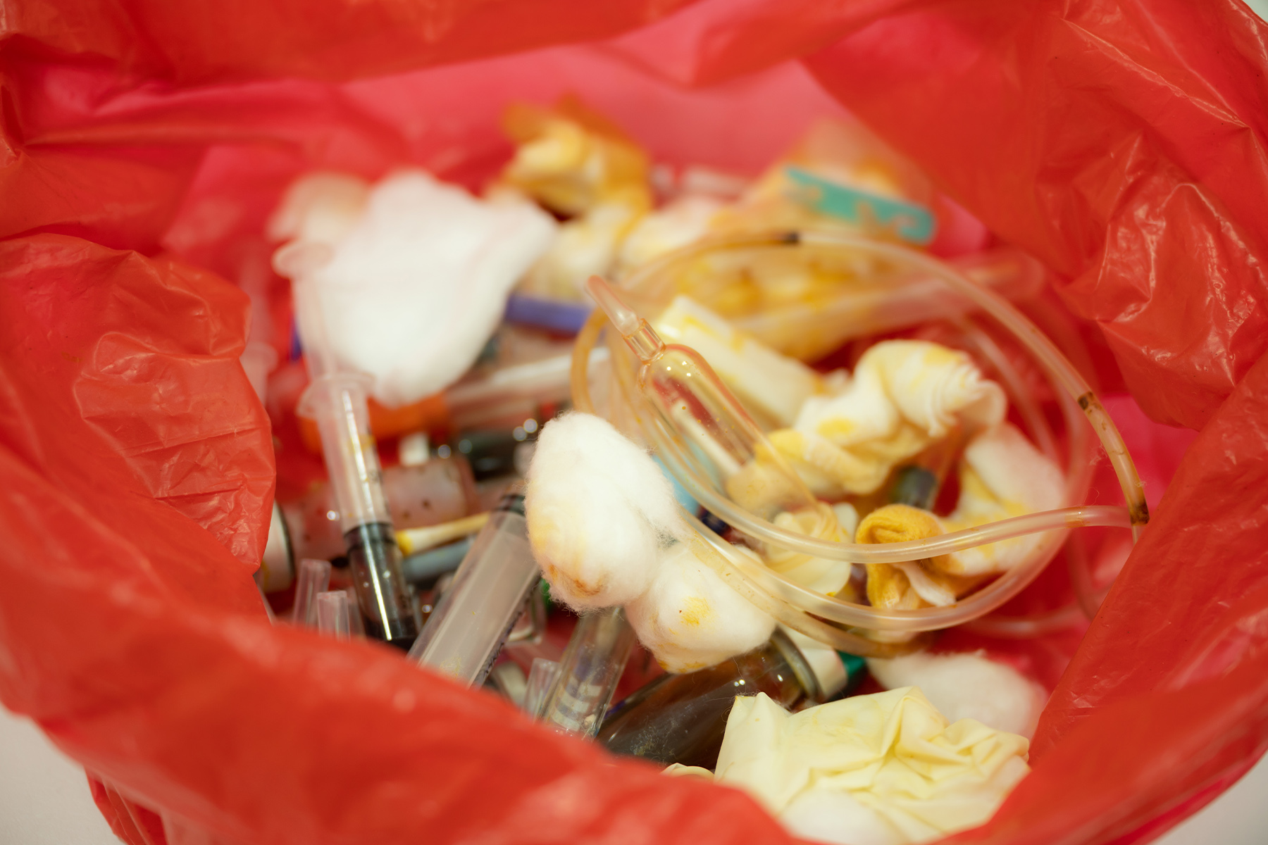 Used medical and dressing clinical and hospital equipment like syringe, cotton in dustbin