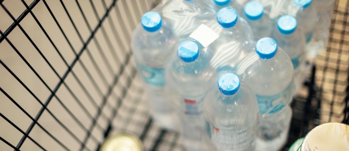 Water packages in supermarket