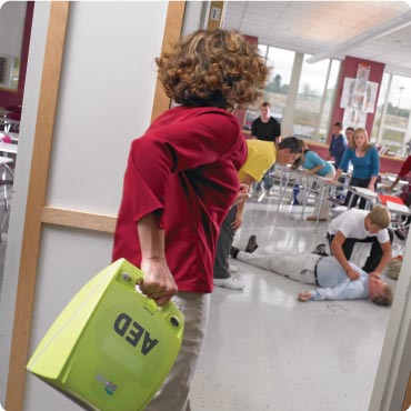 Woman Running with Zoll AED Plus