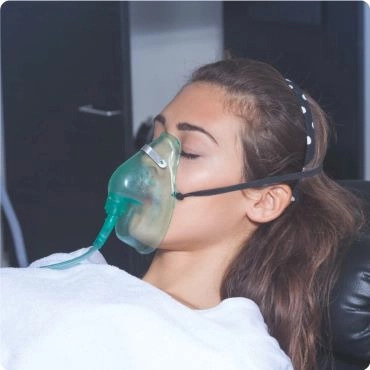 Woman Wearing Oxygen Mask