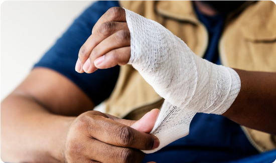 Man putting Bandage On