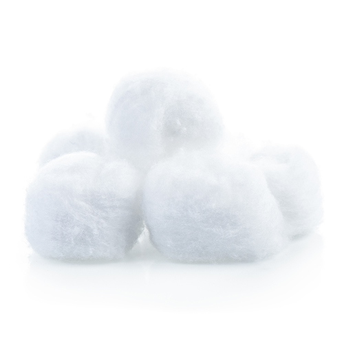 White cotton balls stacked on top of each other in a pile