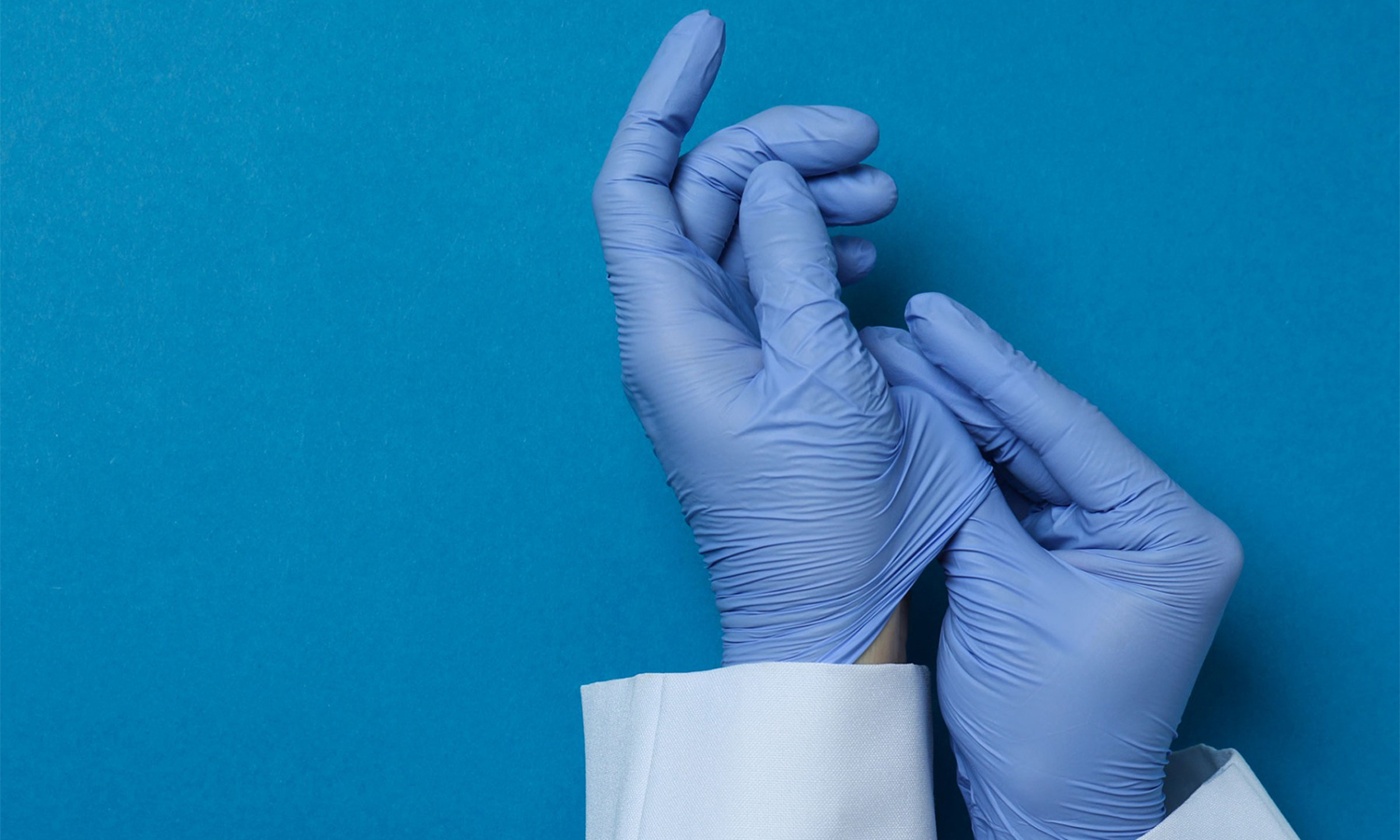 first aider wearing nitrile gloves